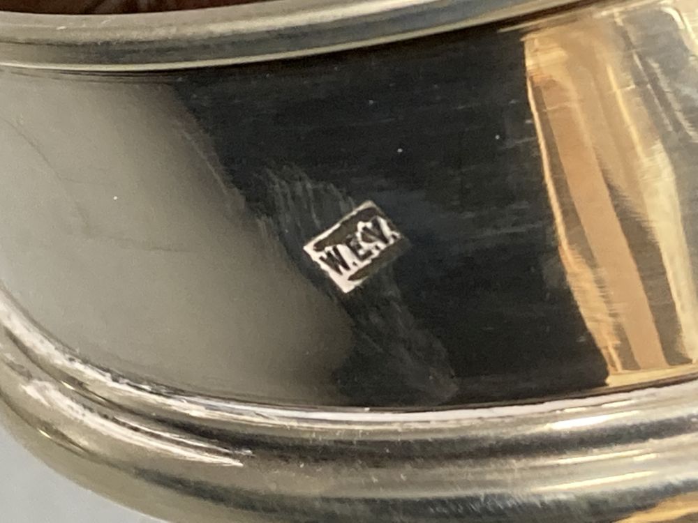 A pair of modern silver mounted wine coasters, W.E.N. London, 1985, 13.2cm.